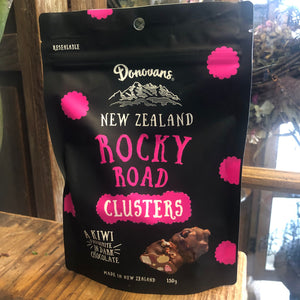 At Blanc Flowers we all love Donovans NZ Rocky Road Clusters, 150 g packet black packaging with yellow writing.
