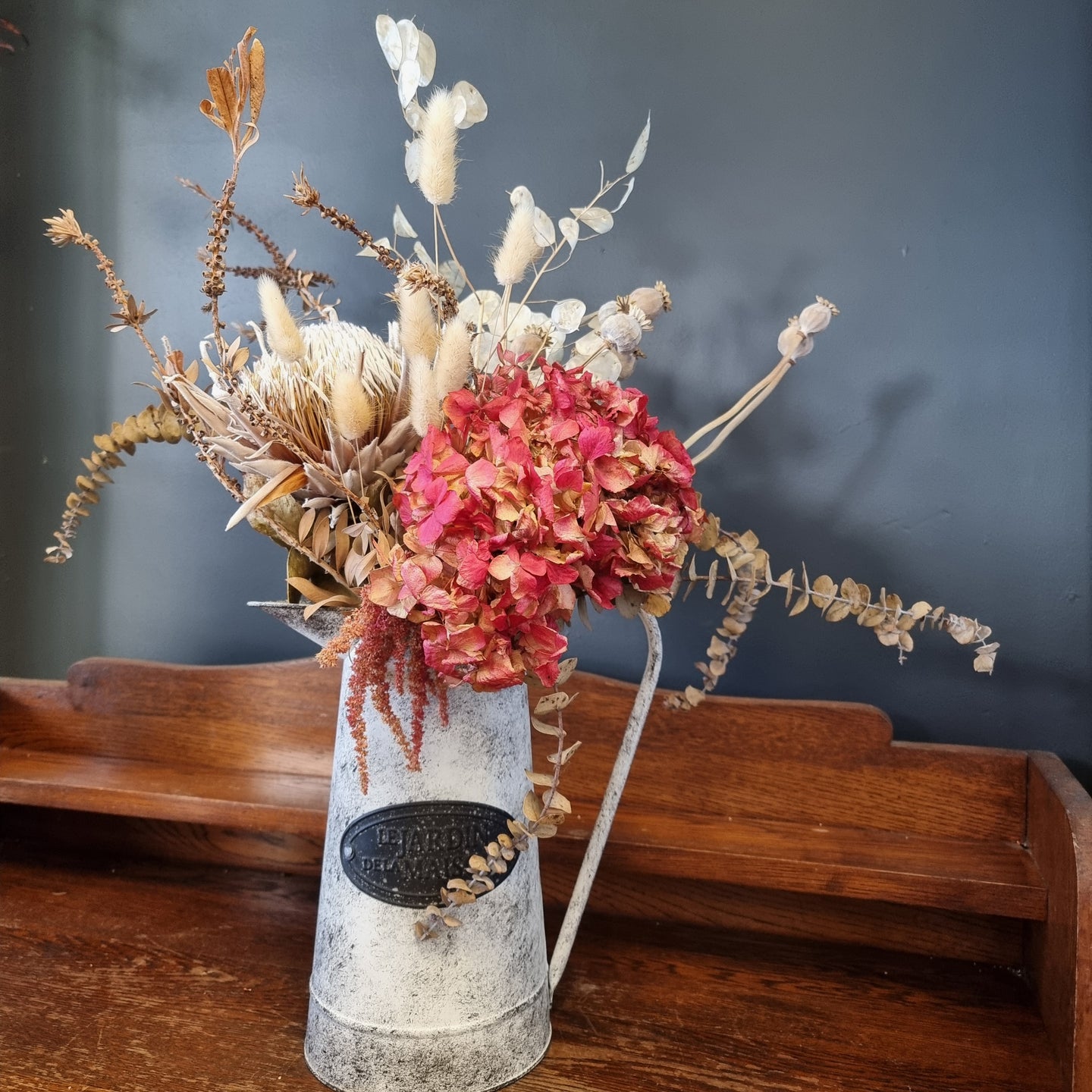 Dried arrangement in jug or pots