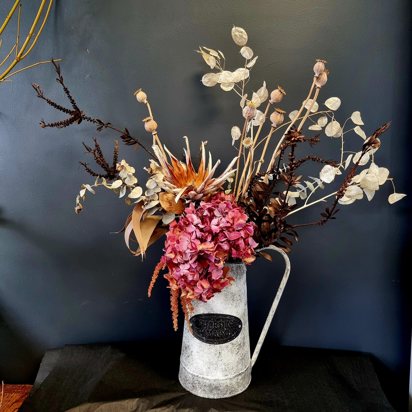 Dried arrangement in jug or pots