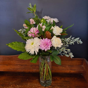 Mother's Day special, bunch of fresh seasonal flowers in a ribbed cylinder glass vase.