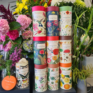 Blanc Flowers collection of beautifully presented Vintage style Cavallini & Co Puzzles in cardboard cylinders.